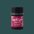 Earl Grey Imperial Teedose frontal vor dunkelgrünem Hintergrund, schwarze Röhre mit pinkem Etikett