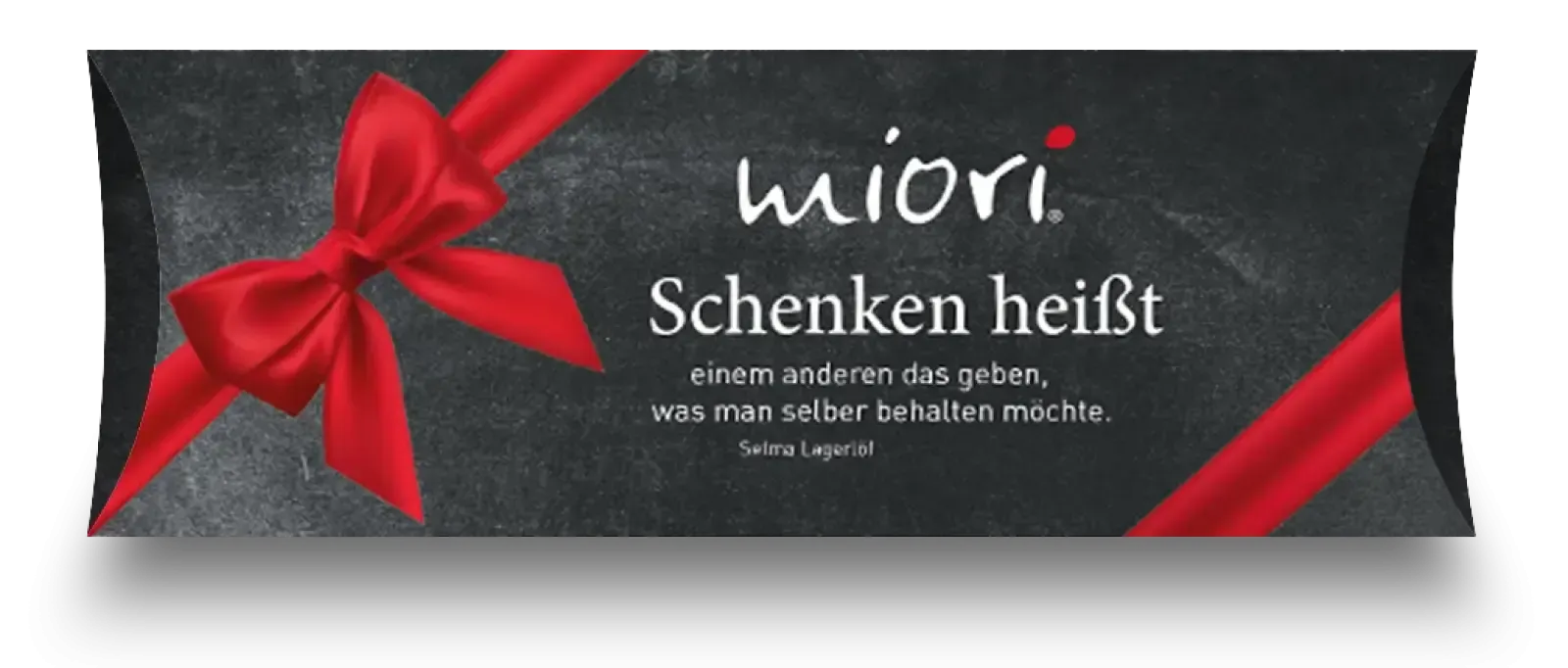 Schwarze miori Geschenkbox mit roter Schleife und Zitat Schenken heißt einem anderen das geben was man behalten möchte